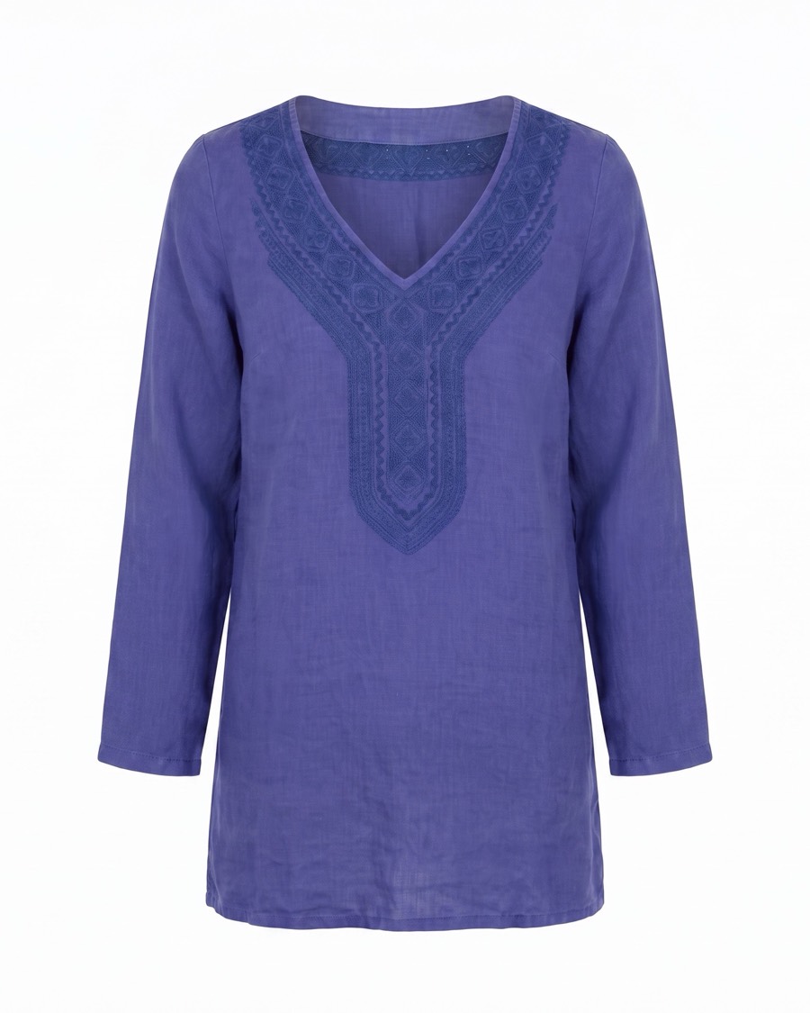 The same tunic as a clean studio product photo on a white background, pressed and tag removed